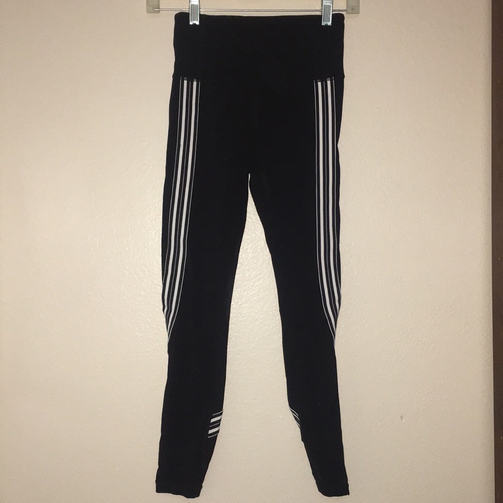 Athleta work out pants with white stripes